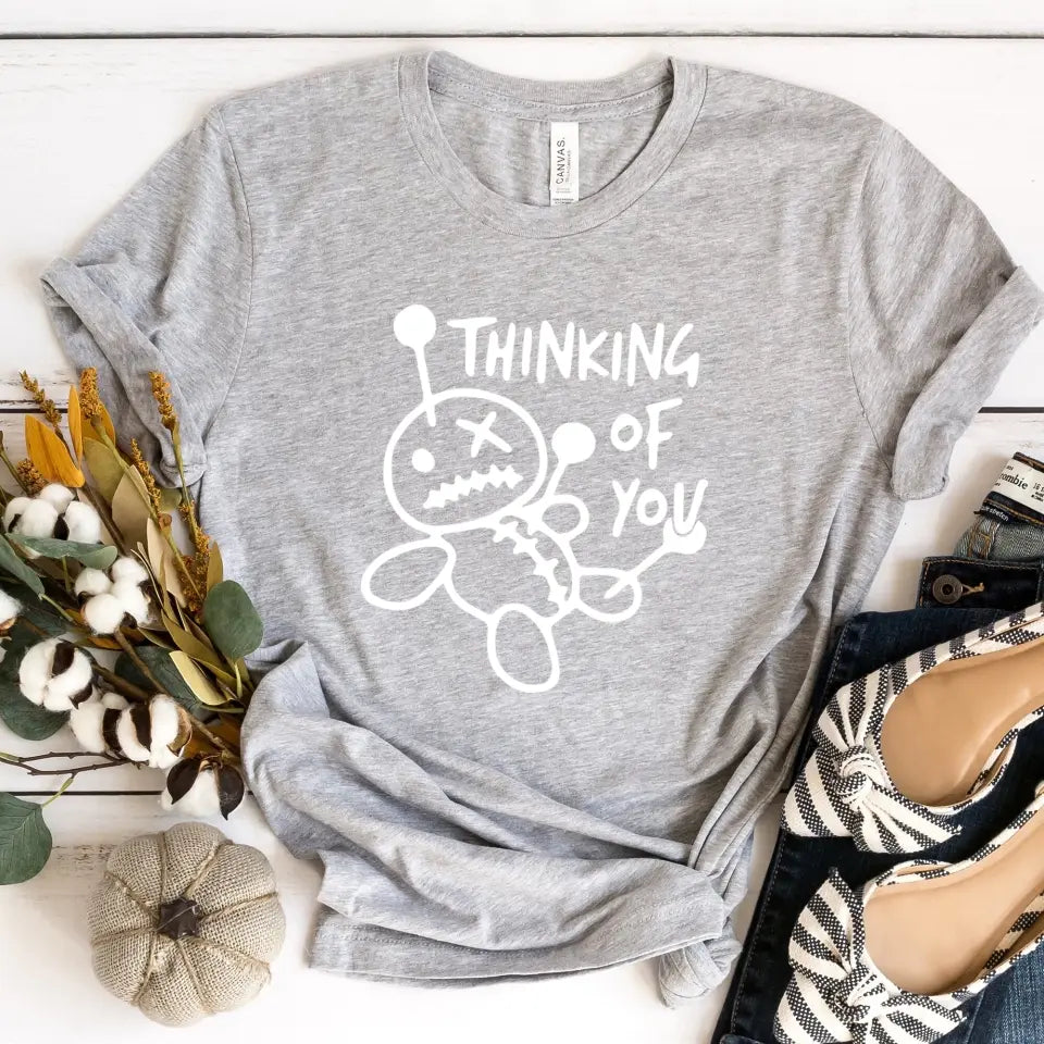 A stylish Thinking About You Tee displayed on a mannequin, showcasing its comfortable fit and vibrant color options.