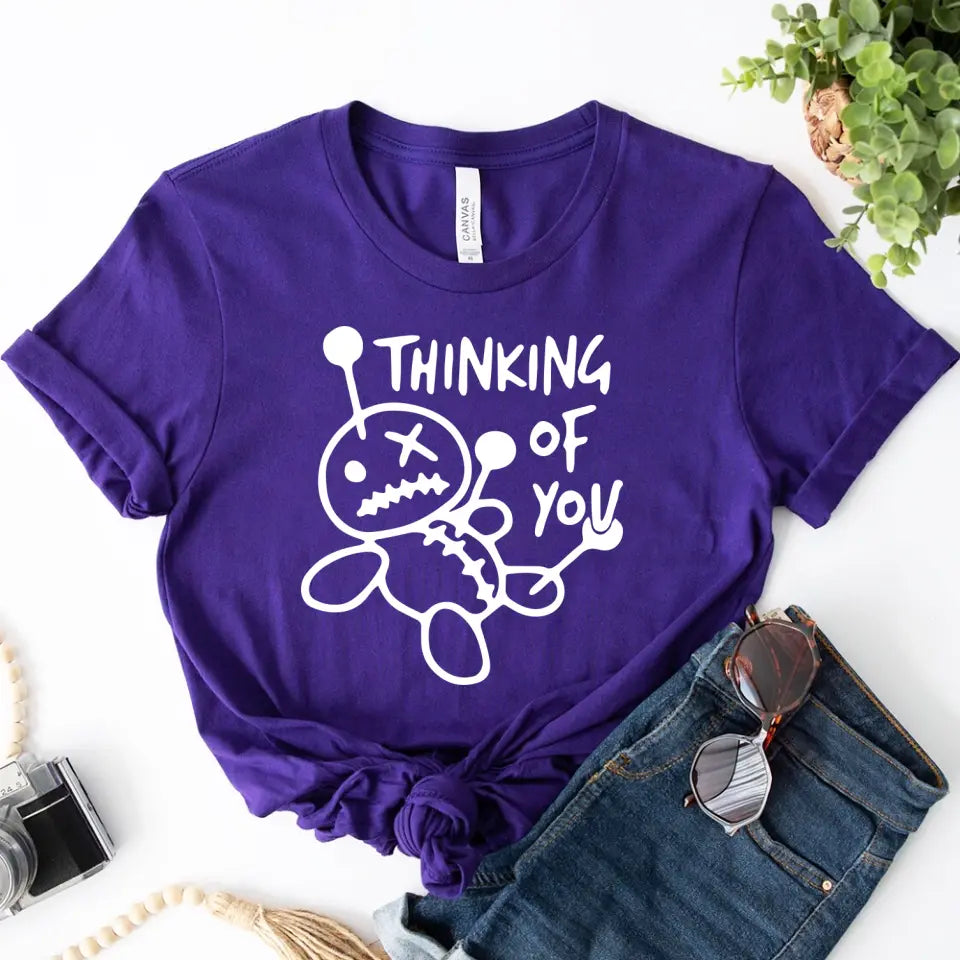 A stylish Thinking About You Tee displayed on a mannequin, showcasing its comfortable fit and vibrant color options.