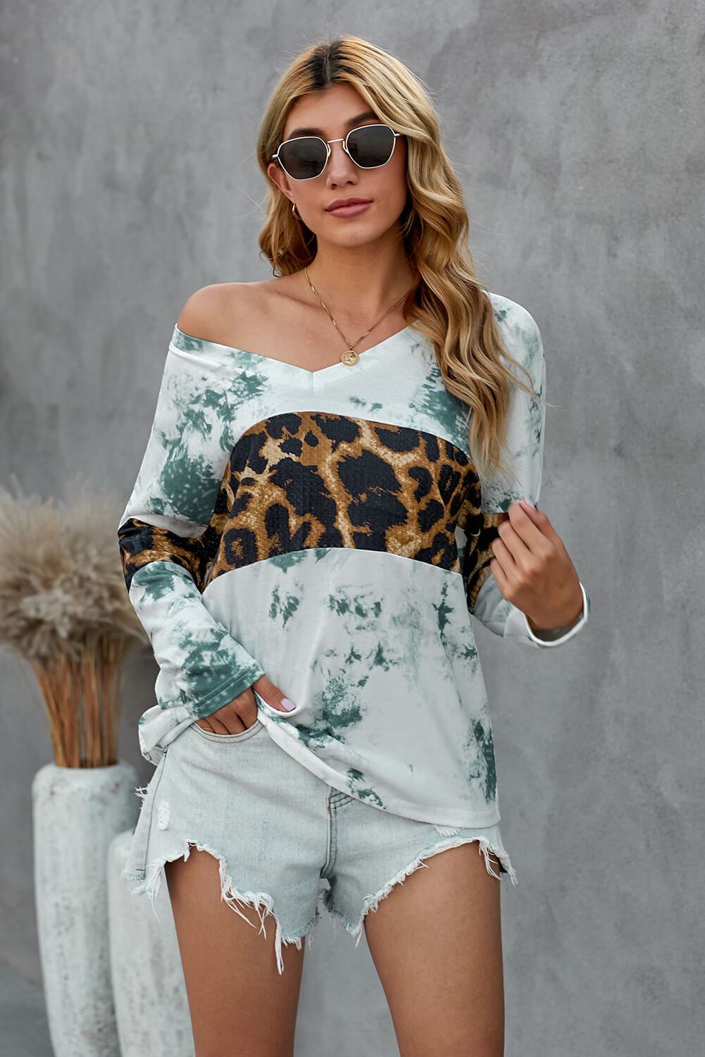 A stylish Tie Dye Print Leopard Splicing V Neck Long Sleeve Top featuring vibrant colors and leopard print accents, perfect for modern women.