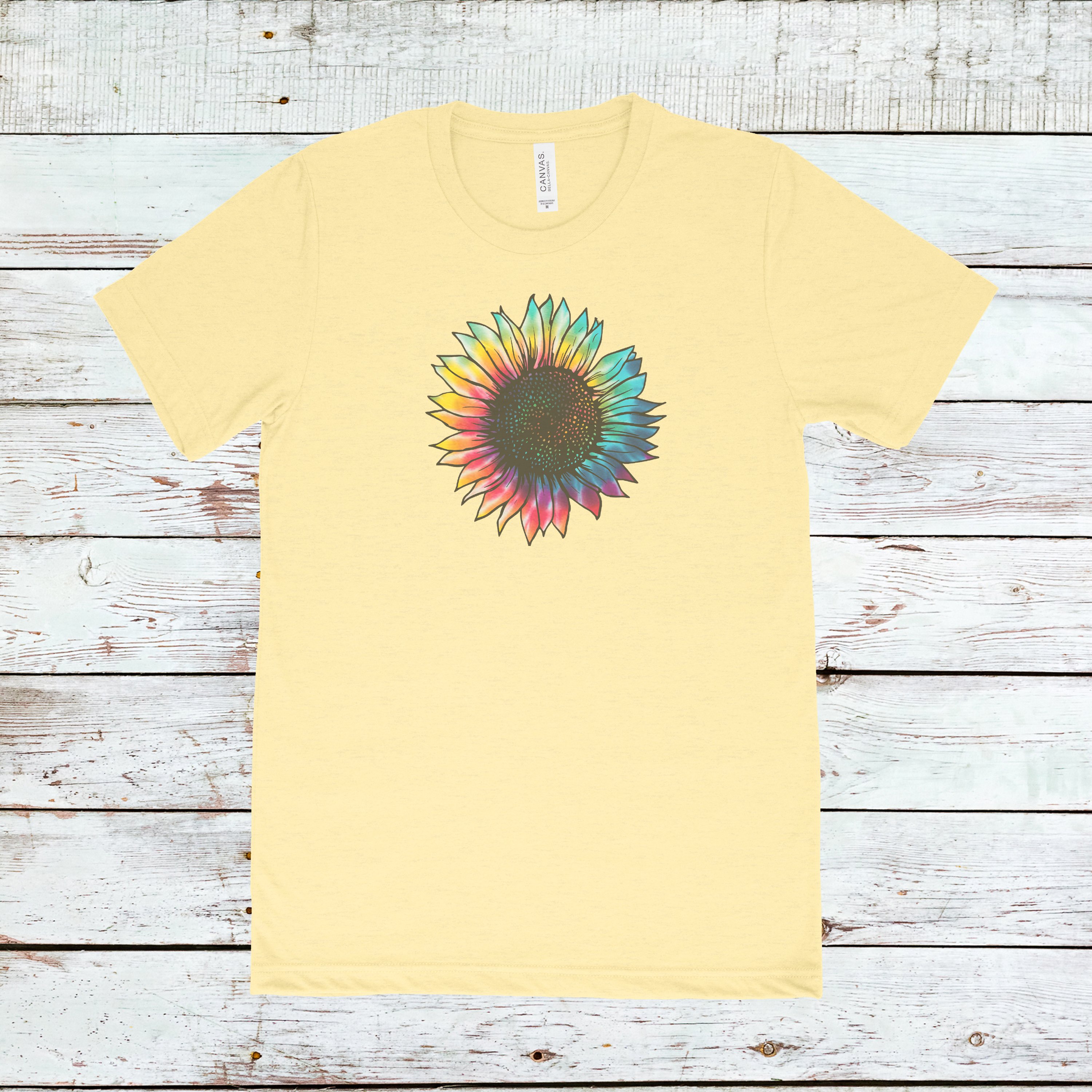 A vibrant tie-dyed sunflower retro vintage triblend tee featuring a crew neck and short sleeves, showcasing a unique and colorful design.