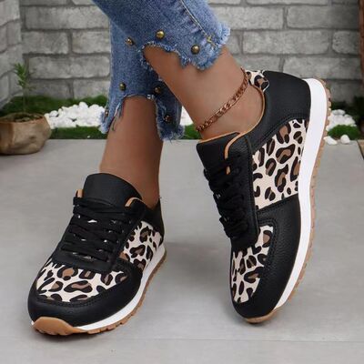 Tied Printed PU Leather Athletic shoes showcasing a stylish design with a flat heel, made from durable PU and polyester materials.