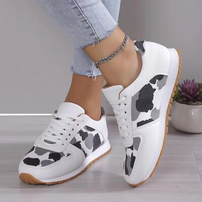 Tied Printed PU Leather Athletic shoes showcasing a stylish design with a flat heel, made from durable PU and polyester materials.