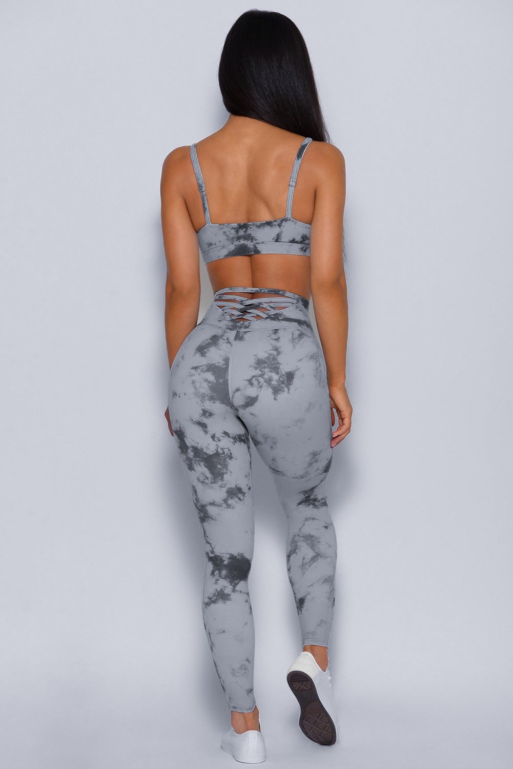 Tie-dye Crisscross Sport Bra and Leggings Set featuring a stylish crisscross design and spaghetti straps, perfect for workouts.