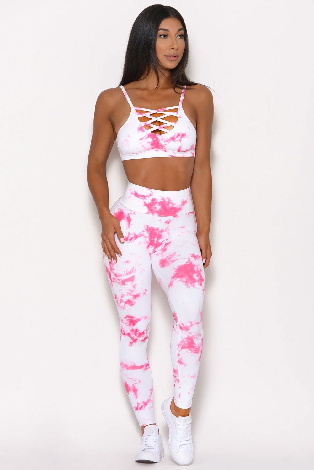 Tie-dye Crisscross Sport Bra and Leggings Set featuring a stylish crisscross design and spaghetti straps, perfect for workouts.