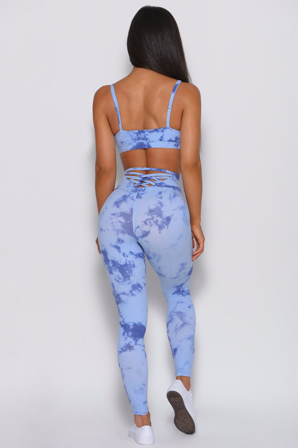 Tie-dye Crisscross Sport Bra and Leggings Set featuring a stylish crisscross design and spaghetti straps, perfect for workouts.