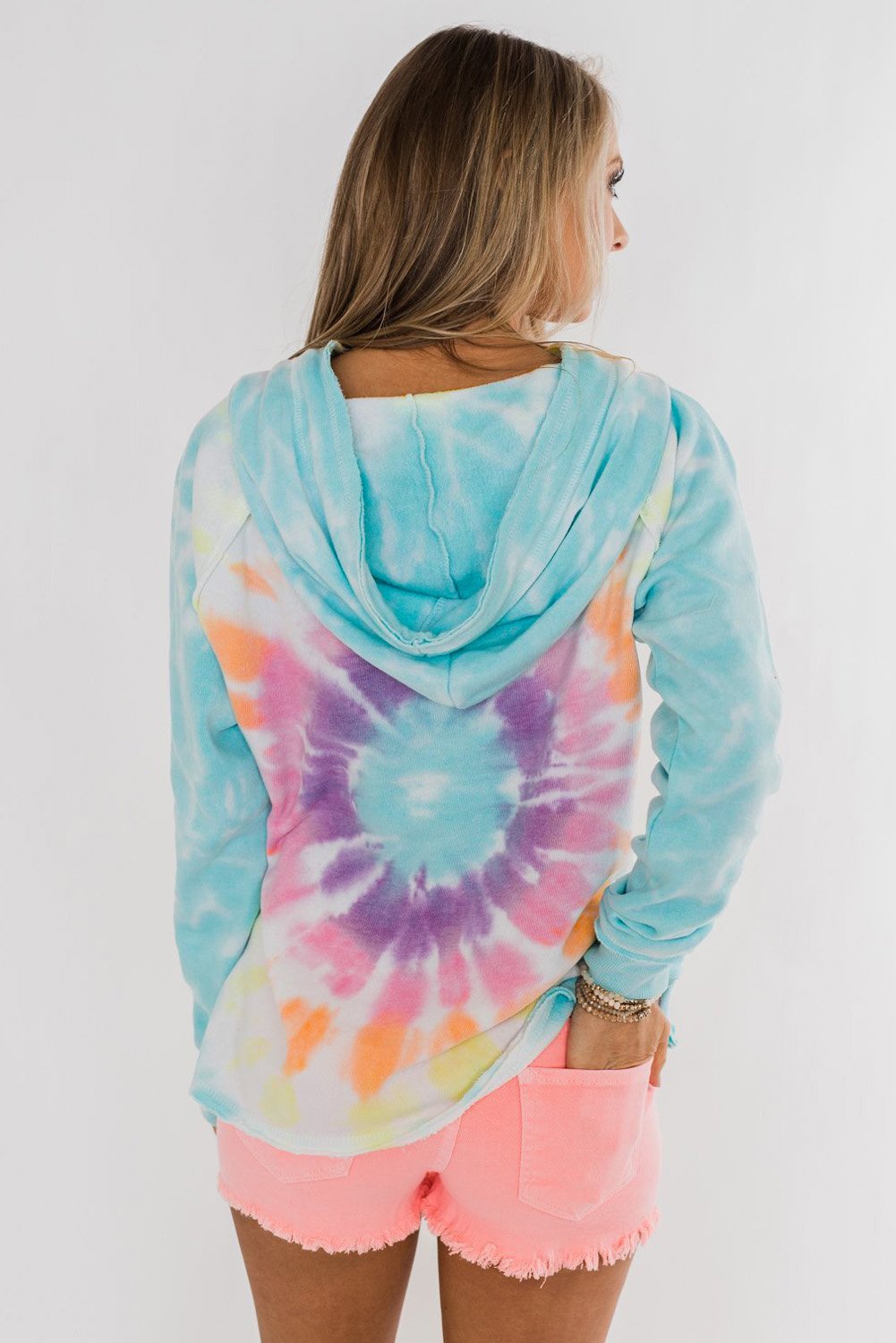 A stylish tie-dye pattern pullover hoodie with adjustable drawstring hood, showcasing vibrant colors and a comfortable fit.