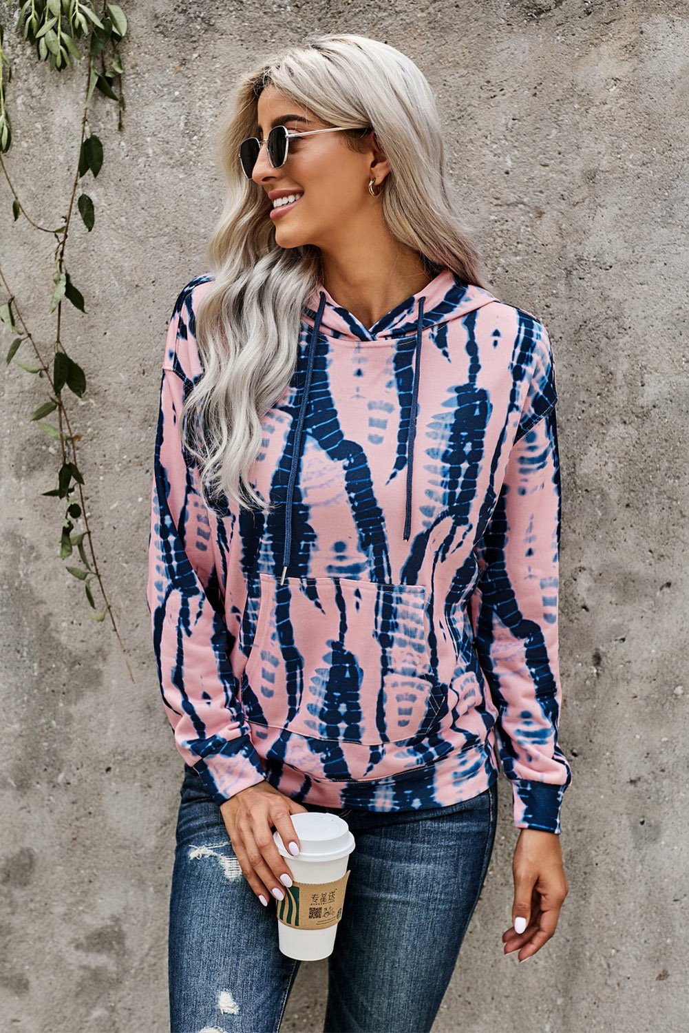 A stylish tie-dye print pullover hoodie featuring vibrant colors and a comfortable fit, perfect for casual wear.