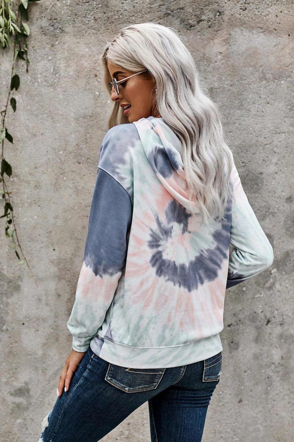 A stylish tie-dye print pullover hoodie featuring vibrant colors and a comfortable fit, perfect for casual wear.