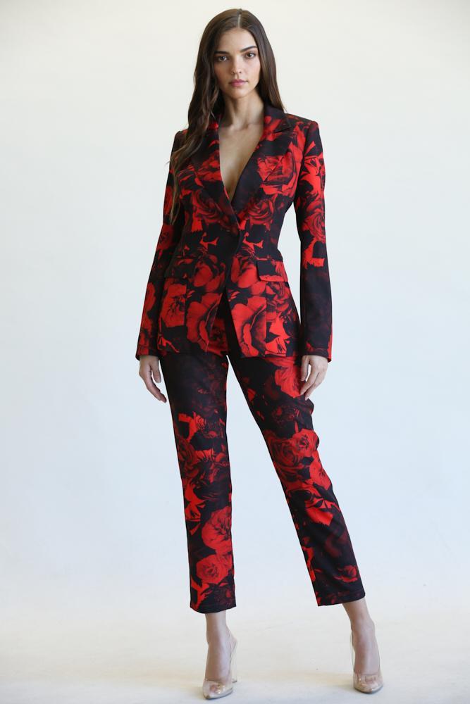 Tiva Blazer and Pant Set featuring a vibrant rose print, notched lapel collar, and tapered high-waist pants.