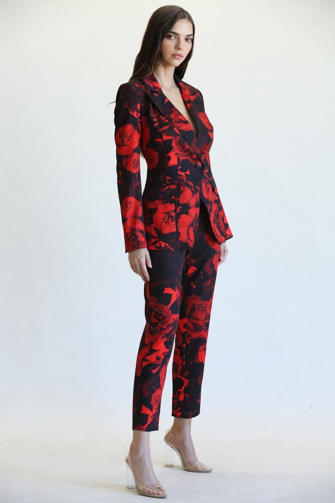 Tiva Blazer and Pant Set featuring a vibrant rose print, notched lapel collar, and tapered high-waist pants.