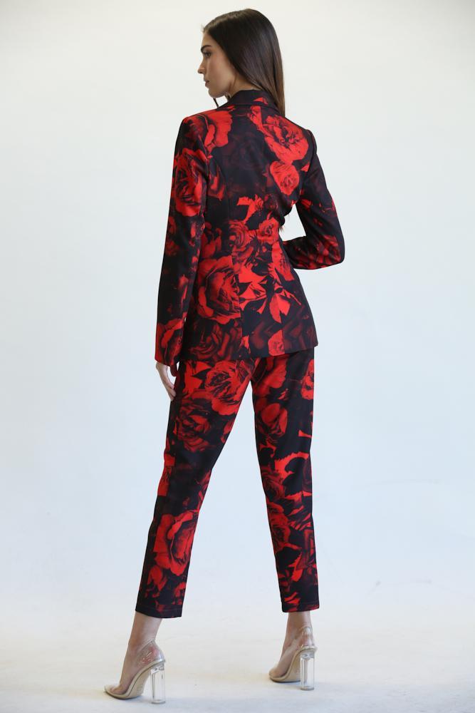 Tiva Blazer and Pant Set featuring a vibrant rose print, notched lapel collar, and tapered high-waist pants.