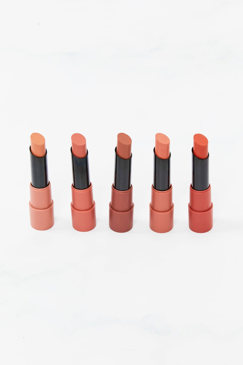 Top Five Mousse Matte Lipstick Set showcasing five vibrant shades in a ghost mannequin style display.