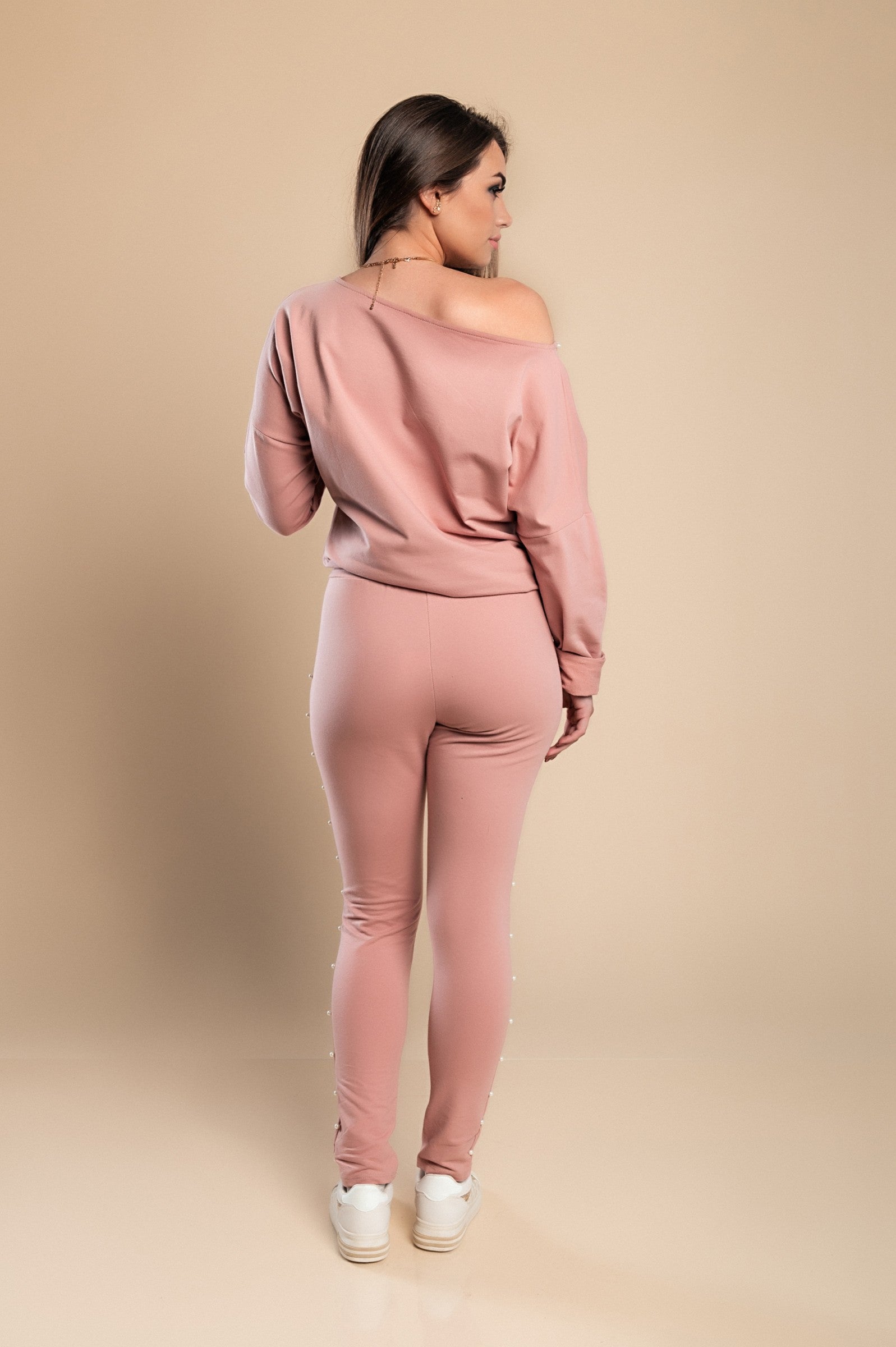 Kyla Tracksuit Set in pink featuring pearl details on the sweatshirt and pants, made of high-quality cotton for comfort.