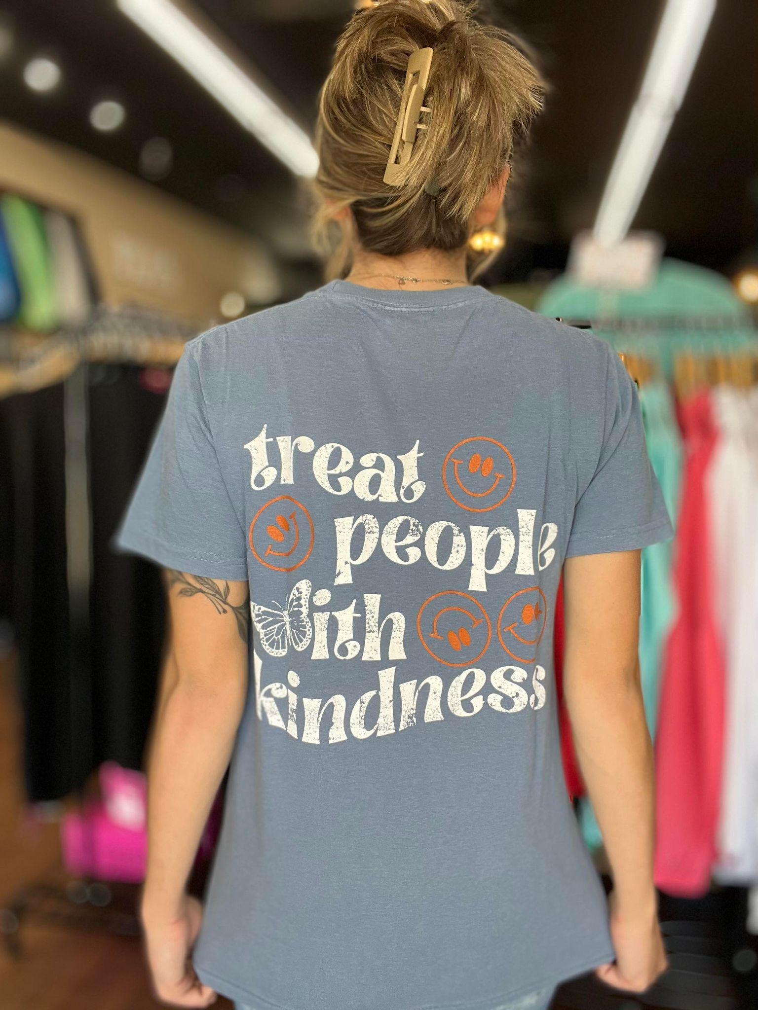 Comfort Colors 'Treat People With Kindness' graphic tee in vibrant colors, showcasing a unisex fit and soft cotton fabric.