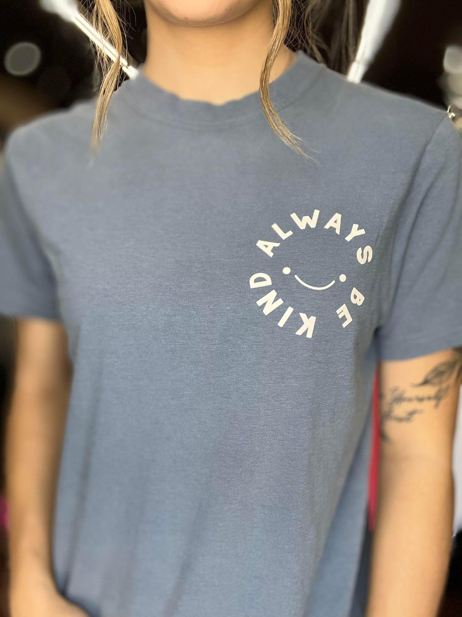 Comfort Colors 'Treat People With Kindness' graphic tee in vibrant colors, showcasing a unisex fit and soft cotton fabric.