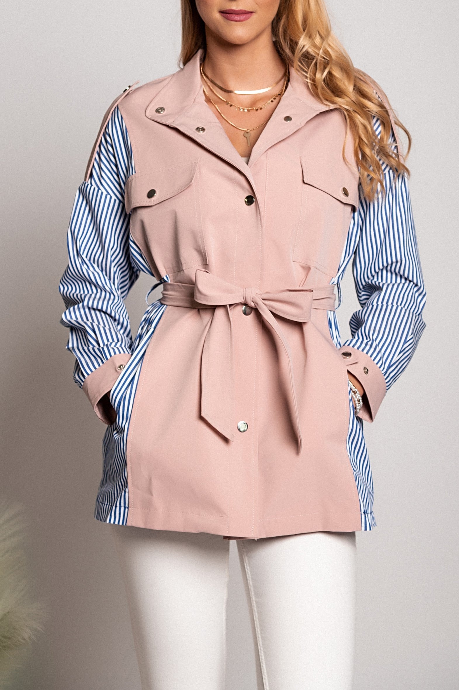 Stylish pink Xalapa trench coat featuring a high collar, long sleeves, and decorative shoulder straps.