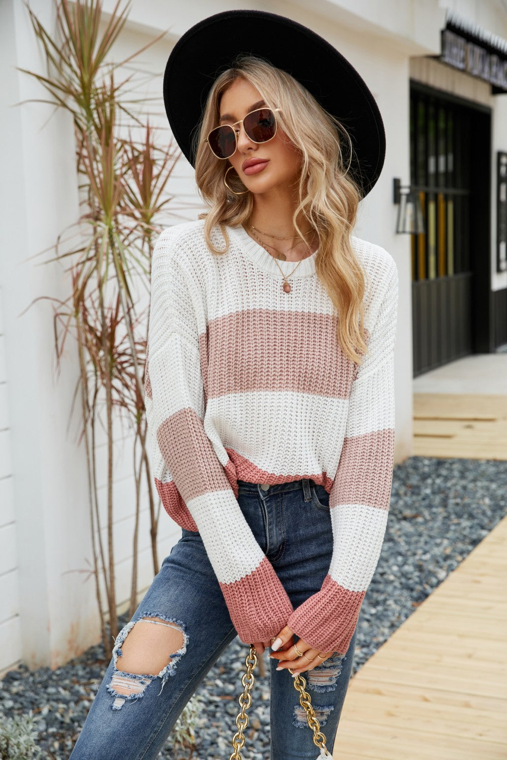 Tricolor color block round neck sweater with dropped shoulders, featuring a chic striped pattern, perfect for casual wear.