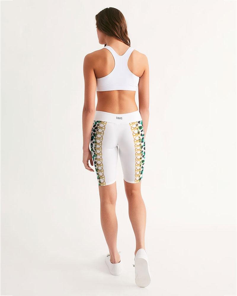 TROPICS OF OZ - INTO THE WILD Women's Mid-Rise Bike Shorts featuring a vibrant animal print on a white background, designed for comfort and style.