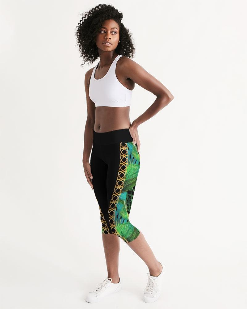 TROPICS OF OZ - INTO THE WILD Women's Mid-Rise Capri featuring a vibrant animal print on a clean white background, designed for comfort and style.