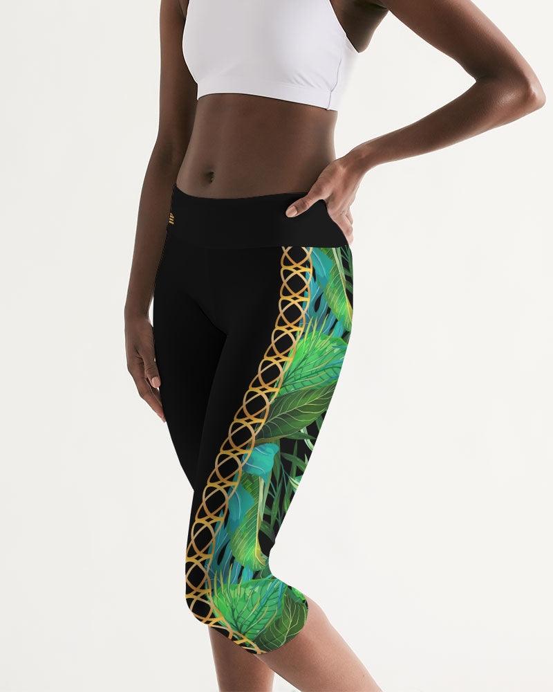 TROPICS OF OZ - INTO THE WILD Women's Mid-Rise Capri featuring a vibrant animal print on a clean white background, designed for comfort and style.