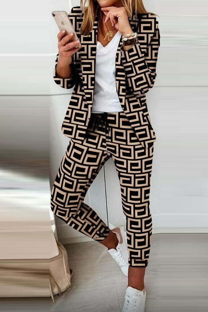 Nunzia black-beige trousers set with blazer featuring a modern geometric print, showcasing elegant design and comfortable fit.