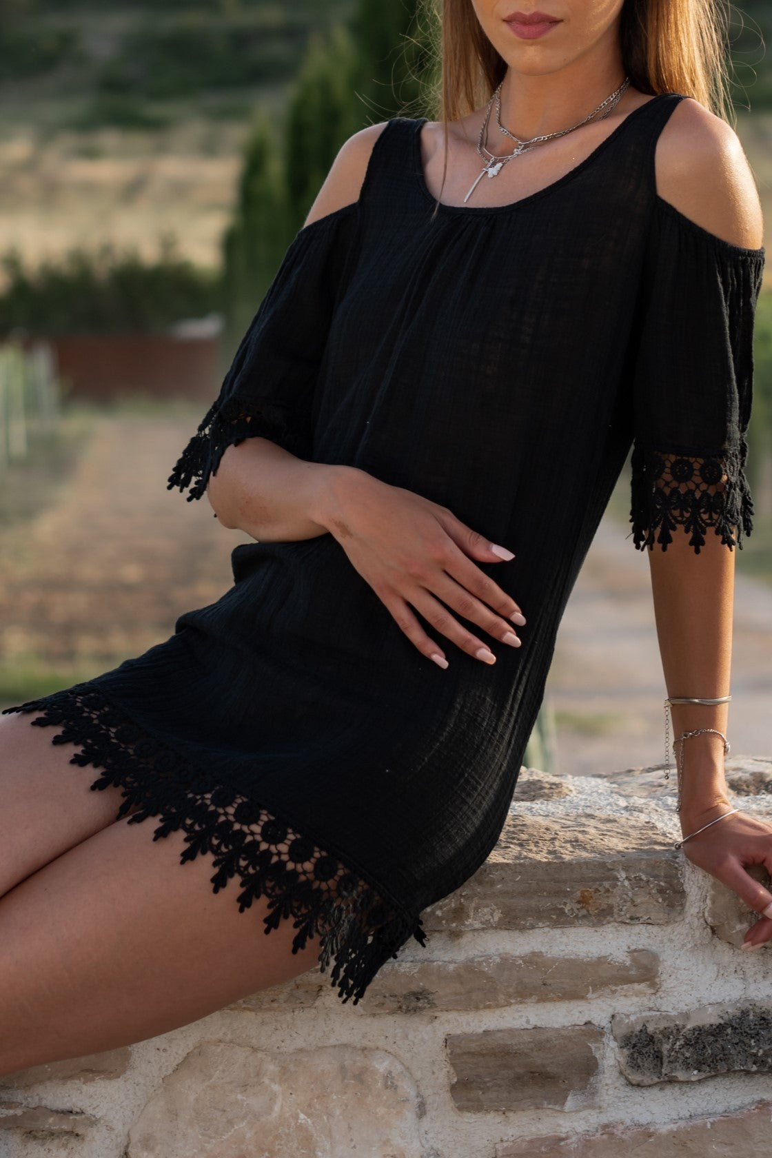 Black TUNIC BECCY featuring 3/4 sleeves, lace details, and a loose fit, perfect for summer outings.