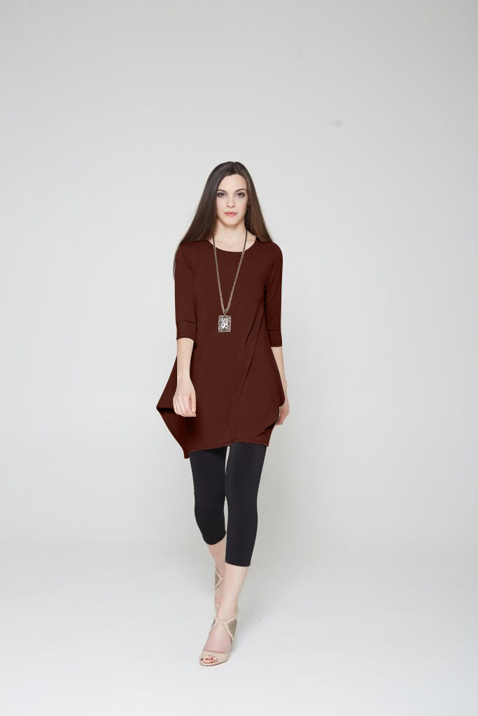 A stylish Tunic Dress featuring a scoop neck, 3/4 sleeves, and convenient side pockets, perfect for versatile wear.