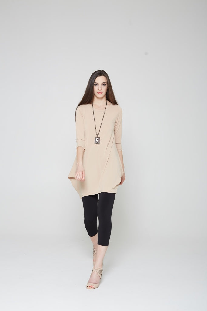 A stylish Tunic Dress featuring a scoop neck, 3/4 sleeves, and convenient side pockets, perfect for versatile wear.