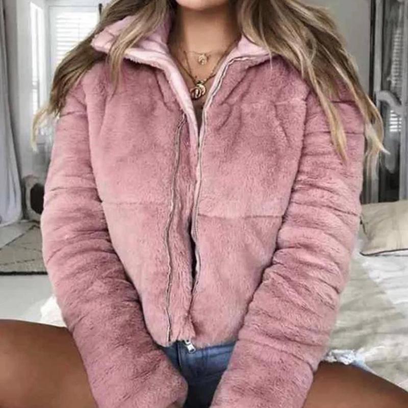 A stylish women's faux fur jacket with a turndown collar, featuring a zipper closure and long sleeves, perfect for winter streetwear.