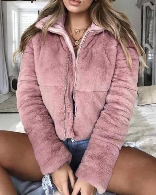 A stylish women's faux fur jacket with a turndown collar, featuring a zipper closure and long sleeves, perfect for winter streetwear.