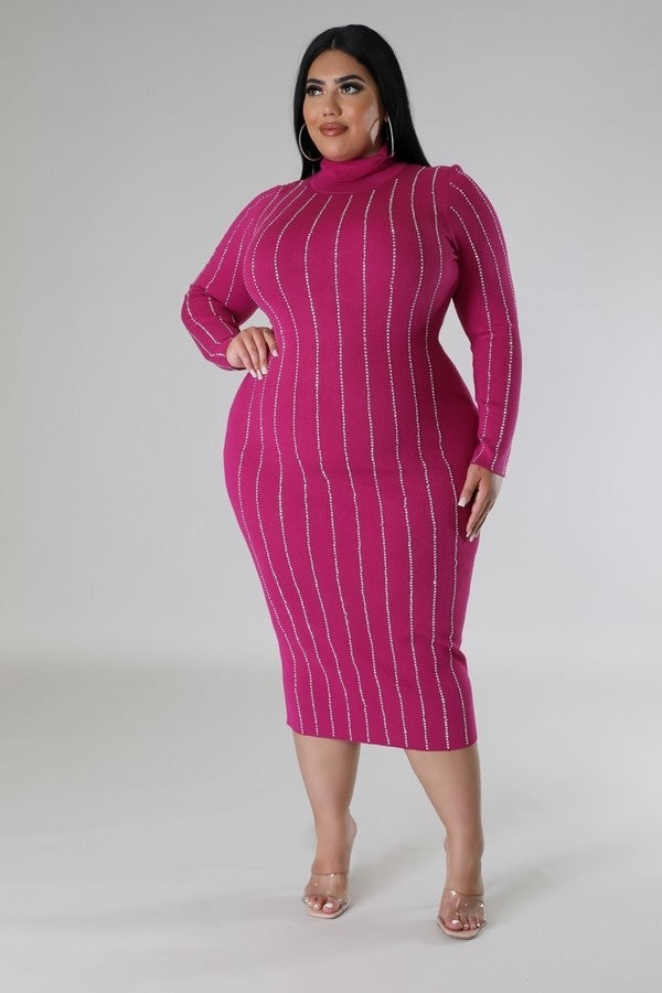 A stylish magenta turtle neck stretch dress with long sleeves and rhinestone detailing, perfect for plus sizes.