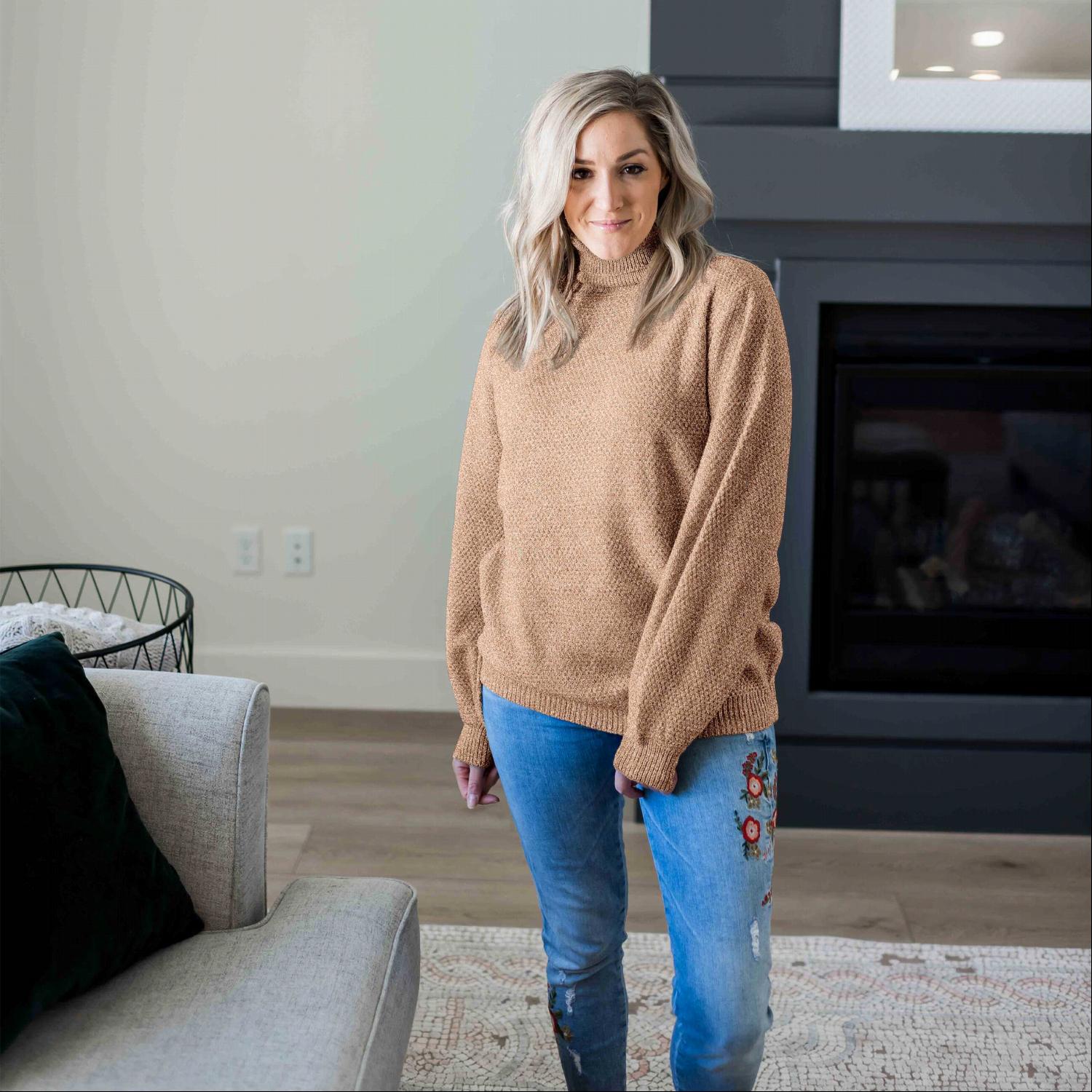 A cozy Turtleneck Melange Balloon Sleeve Sweater in a stylish oversized fit, featuring long balloon sleeves and a ribbed turtleneck.