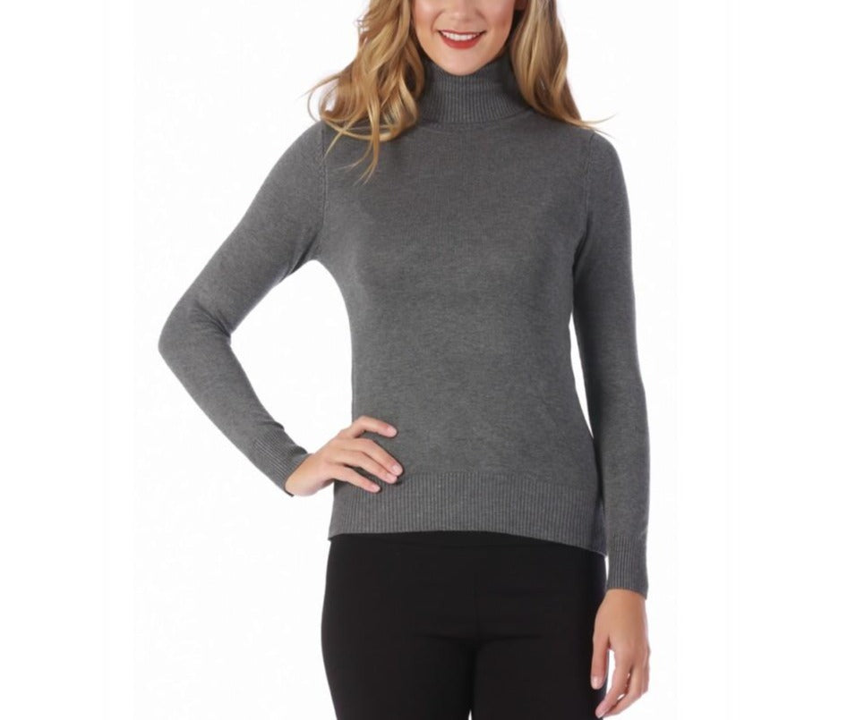 A stylish turtleneck sweater featuring ribbed cuffs and hem, perfect for layering and keeping warm during colder months.