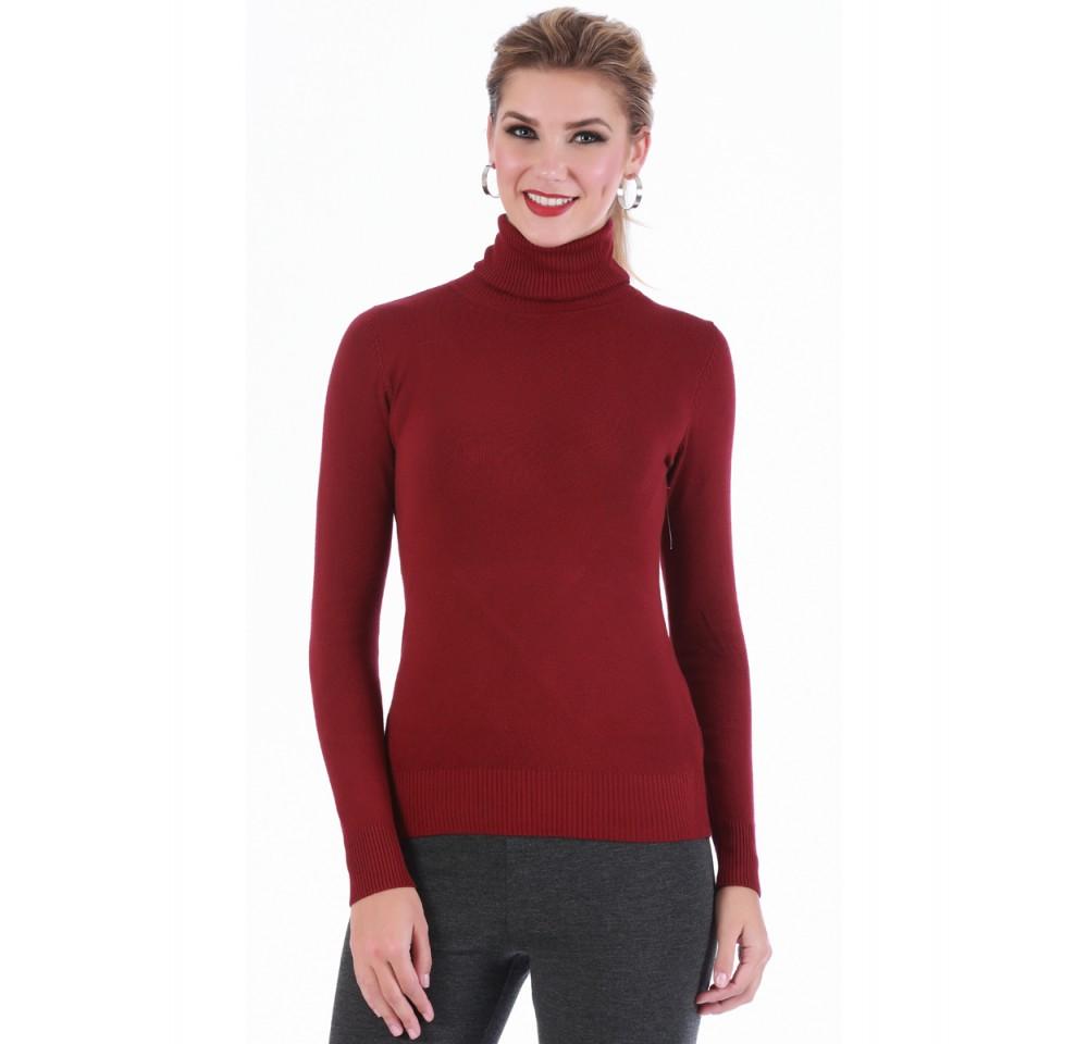 A stylish turtleneck sweater featuring ribbed cuffs and hem, perfect for layering and keeping warm during colder months.