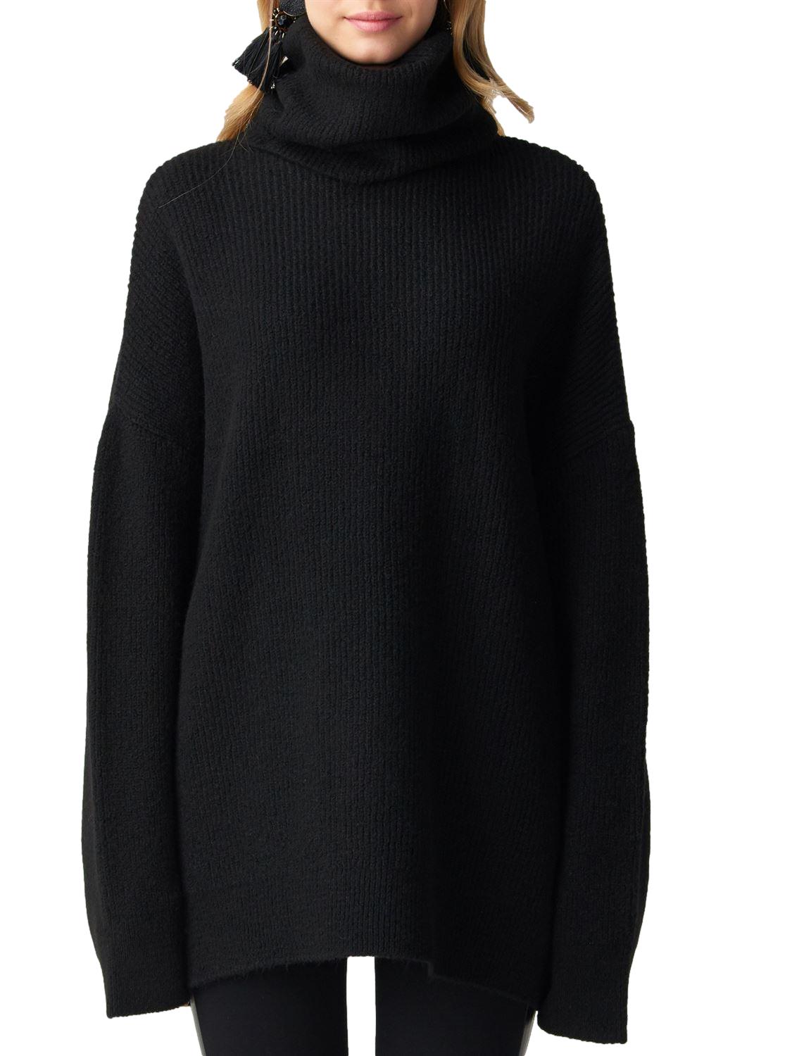 A cozy Turtleneck Wide Sweater in a soft acrylic-polyester blend, featuring a relaxed fit and stylish turtleneck design.