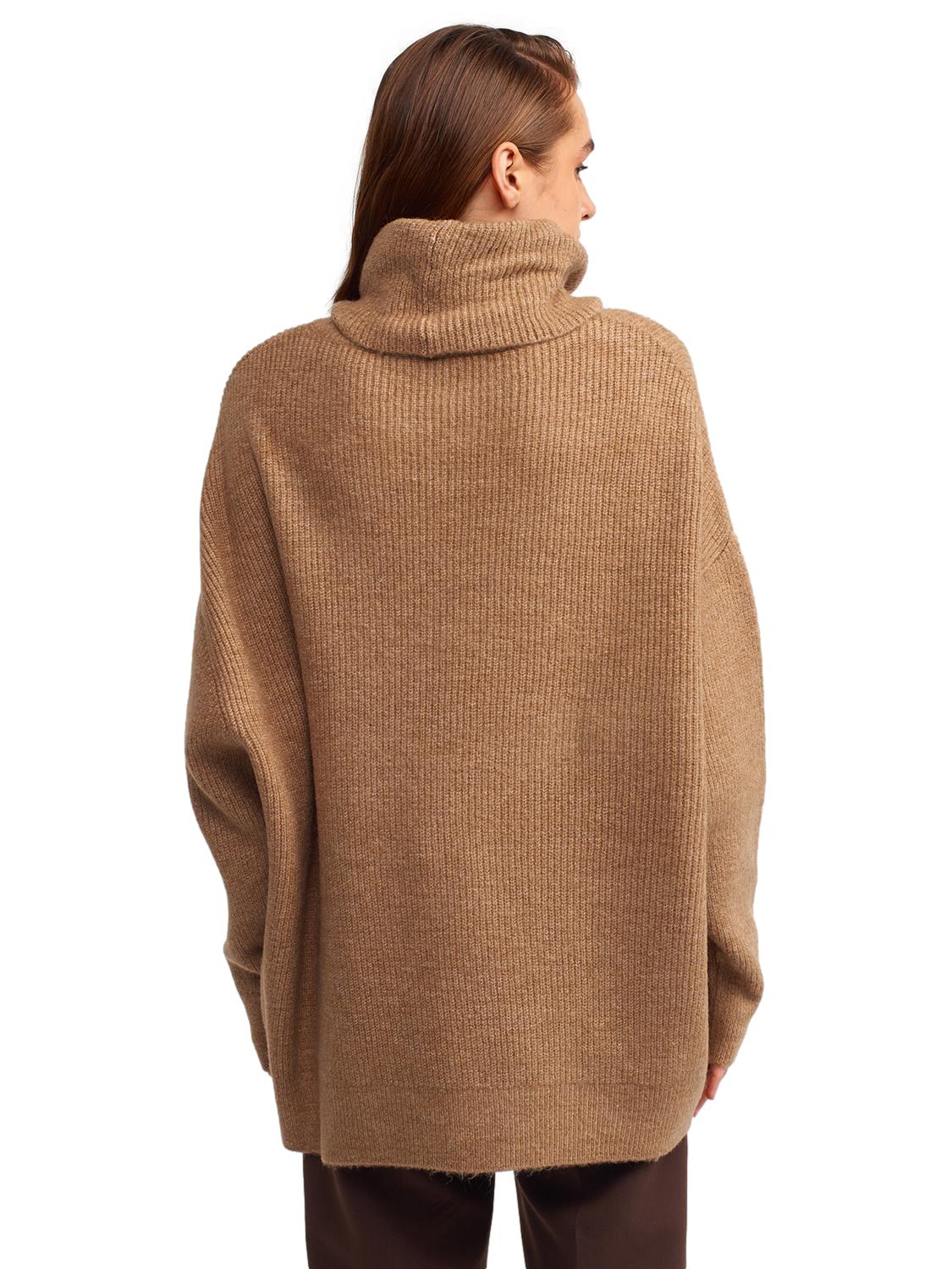 A cozy Turtleneck Wide Sweater in a soft acrylic-polyester blend, featuring a relaxed fit and stylish turtleneck design.