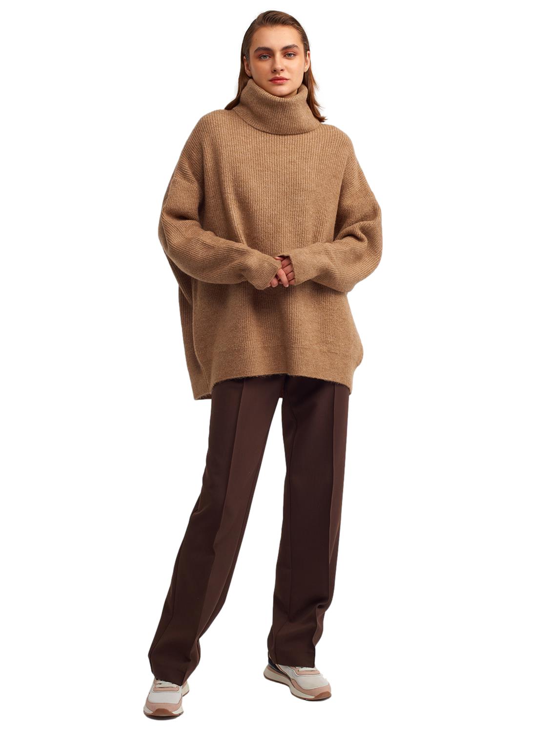 A cozy Turtleneck Wide Sweater in a soft acrylic-polyester blend, featuring a relaxed fit and stylish turtleneck design.