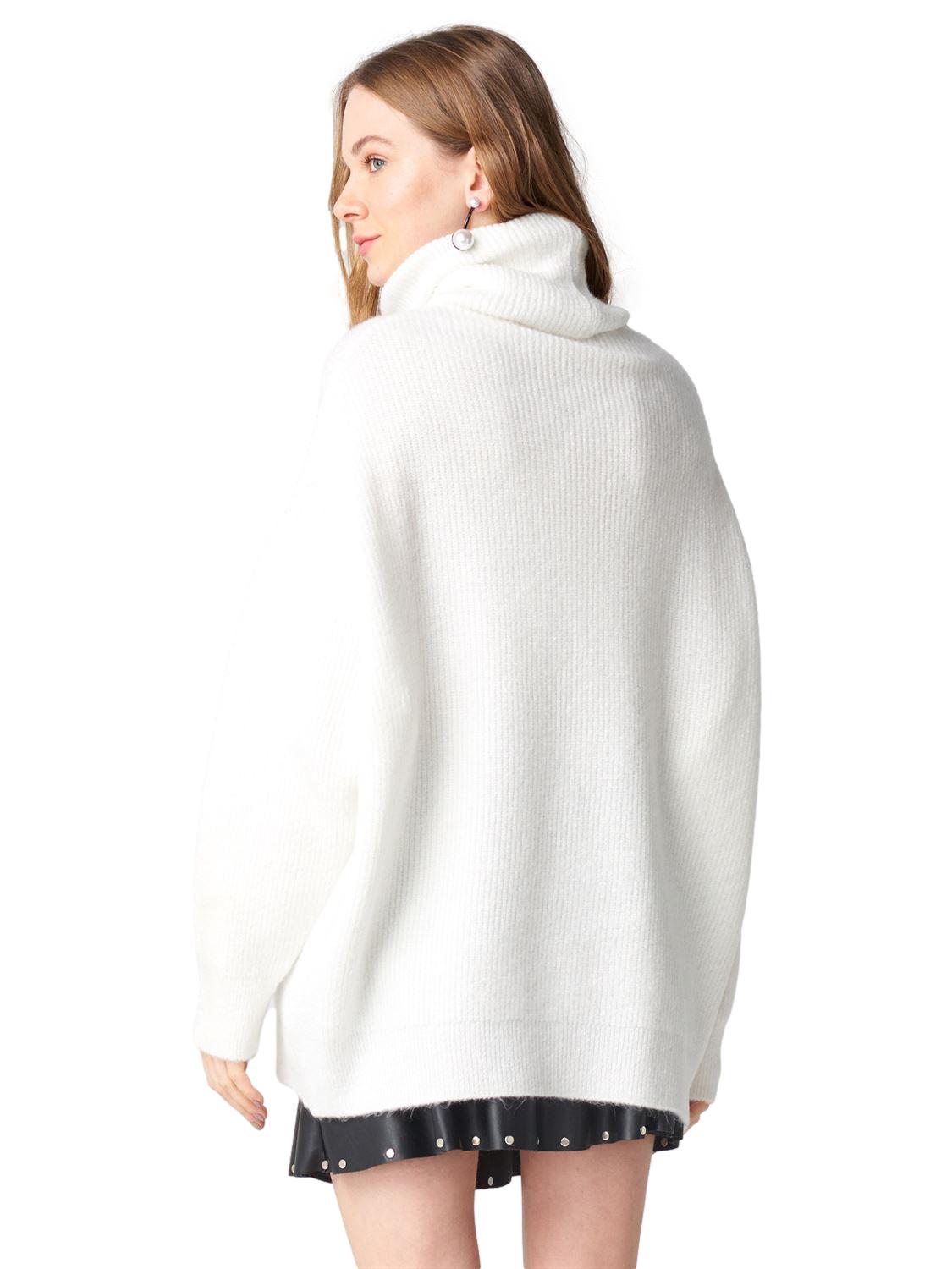 A cozy Turtleneck Wide Sweater in a soft acrylic-polyester blend, featuring a relaxed fit and stylish turtleneck design.