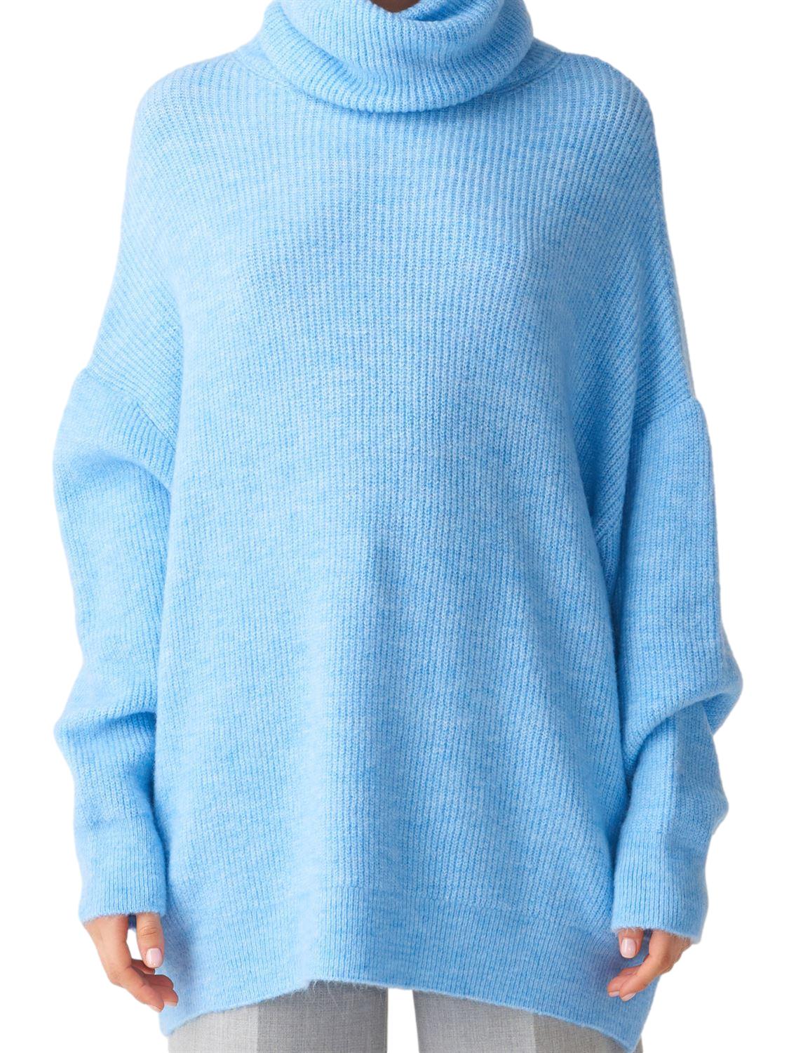 A cozy Turtleneck Wide Sweater in a soft acrylic-polyester blend, featuring a relaxed fit and stylish turtleneck design.