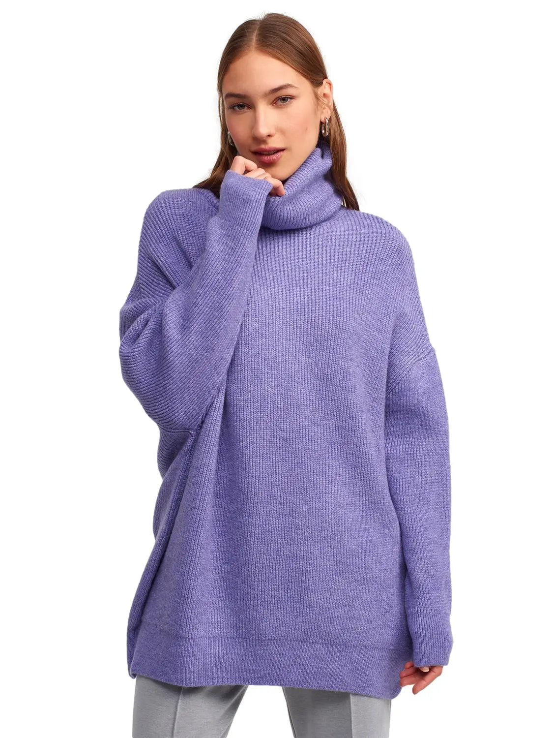 A cozy Turtleneck Wide Sweater in a soft acrylic-polyester blend, featuring a relaxed fit and stylish turtleneck design.