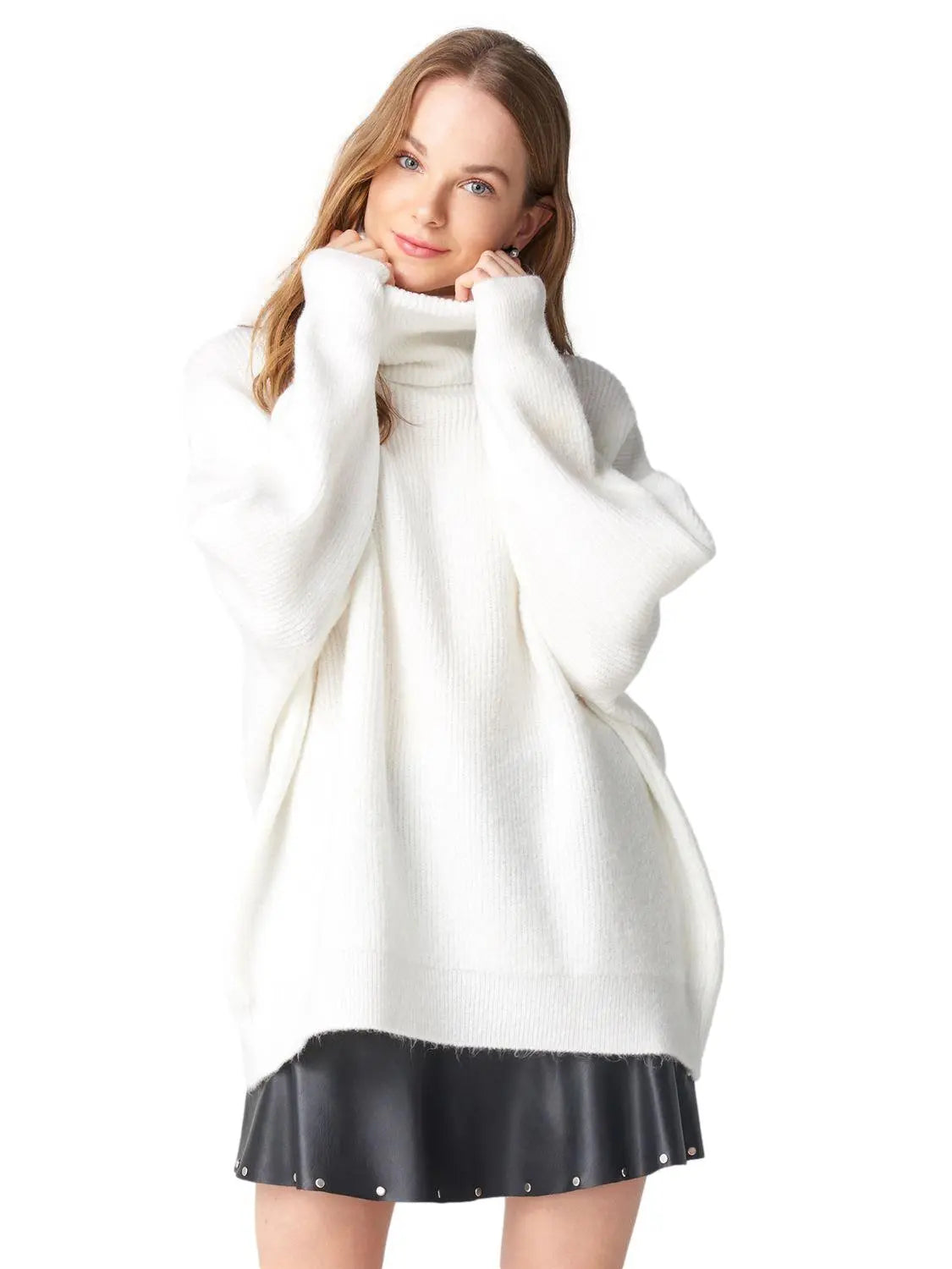 A cozy Turtleneck Wide Sweater in a soft acrylic-polyester blend, featuring a relaxed fit and stylish turtleneck design.