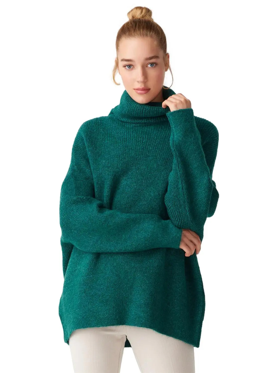 A cozy Turtleneck Wide Sweater in a soft acrylic-polyester blend, featuring a relaxed fit and stylish turtleneck design.