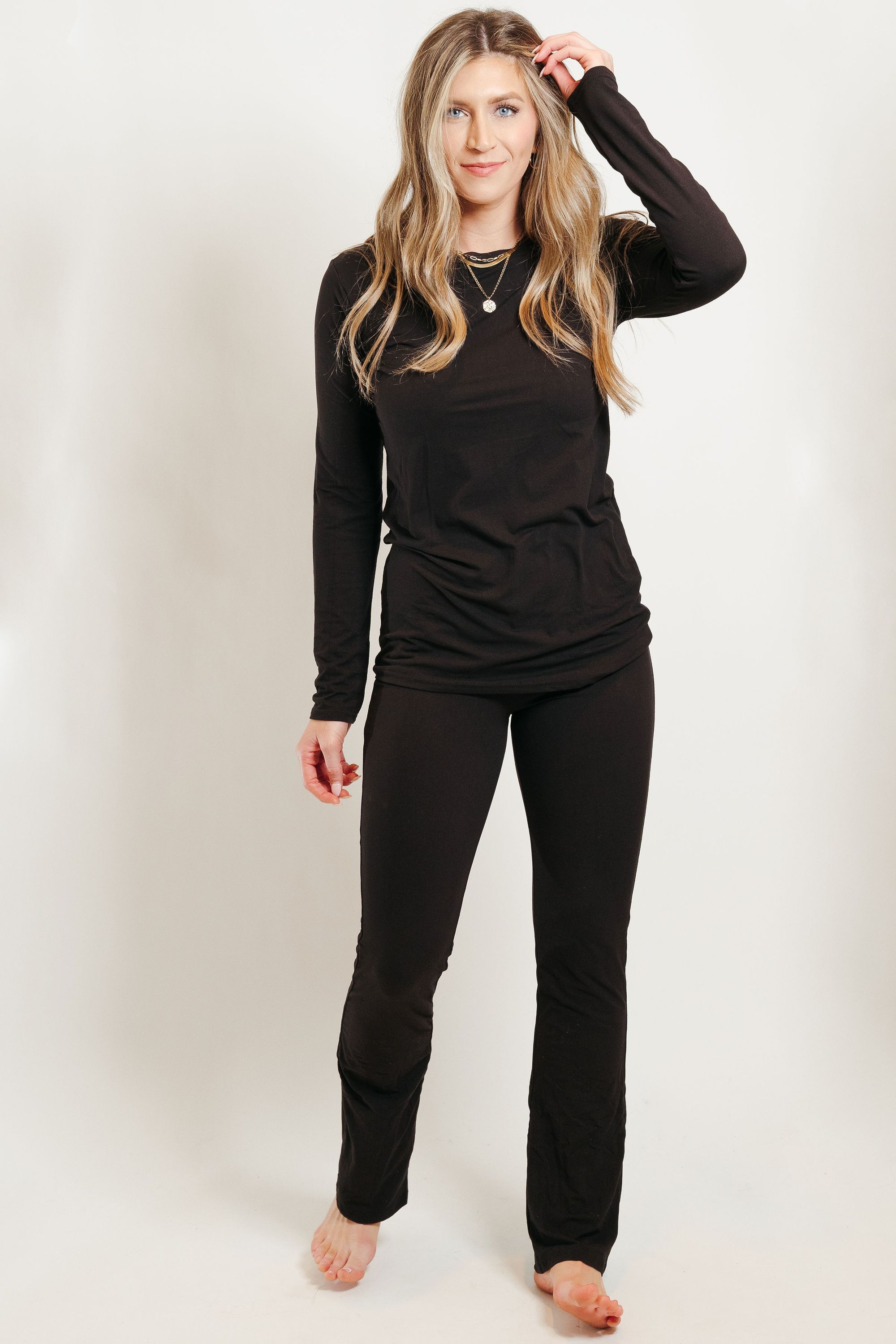 Ultra Soft Flair Pant Set in Black, featuring a stylish and comfortable design made from soft fabric, perfect for casual wear.