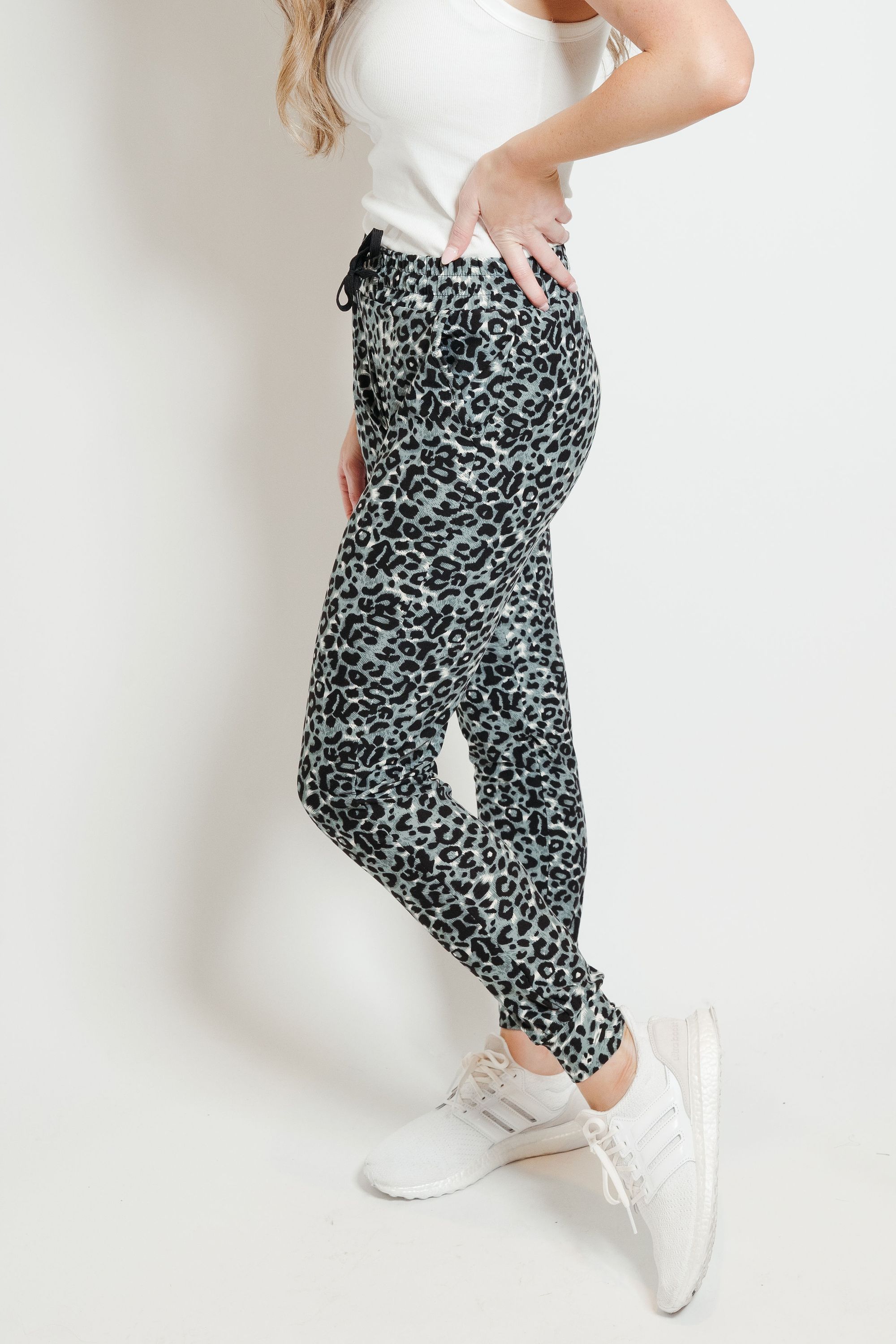 A pair of ultra-soft gray leopard joggers, showcasing a stylish print and comfortable fit, perfect for lounging or casual outings.