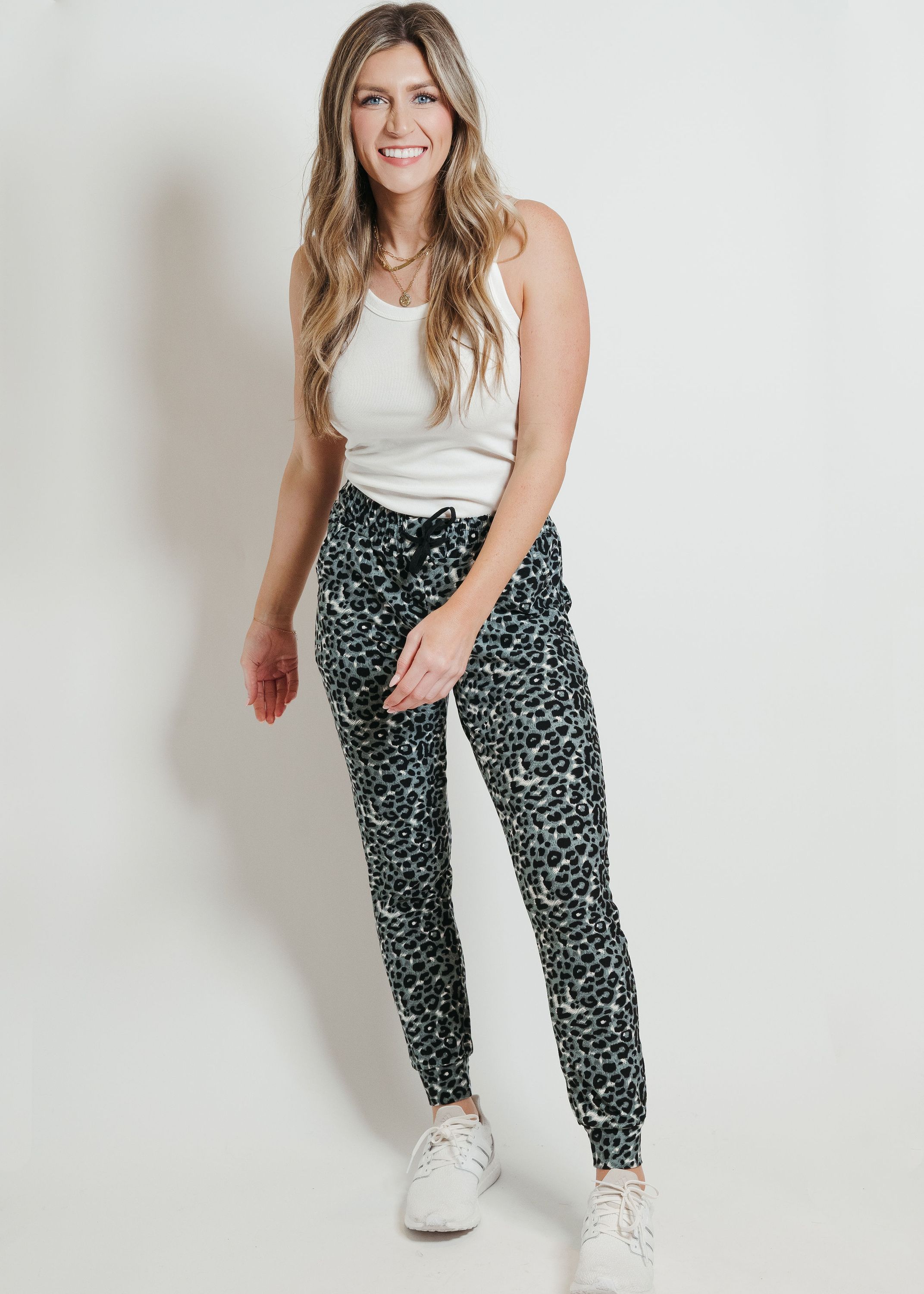 A pair of ultra-soft gray leopard joggers, showcasing a stylish print and comfortable fit, perfect for lounging or casual outings.