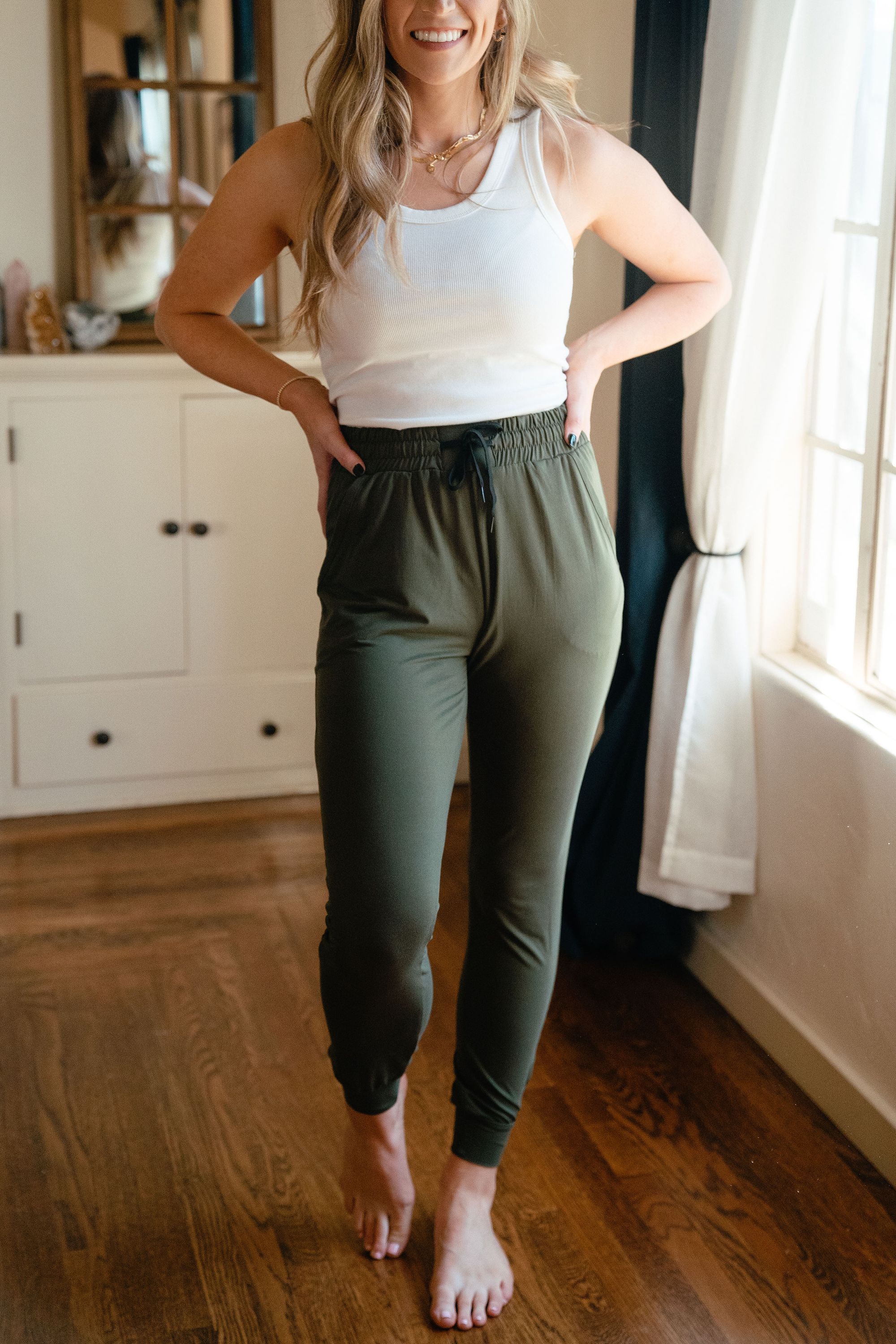 A pair of olive green ultra soft joggers, showcasing a comfortable fit with a stylish design, perfect for lounging or casual outings.