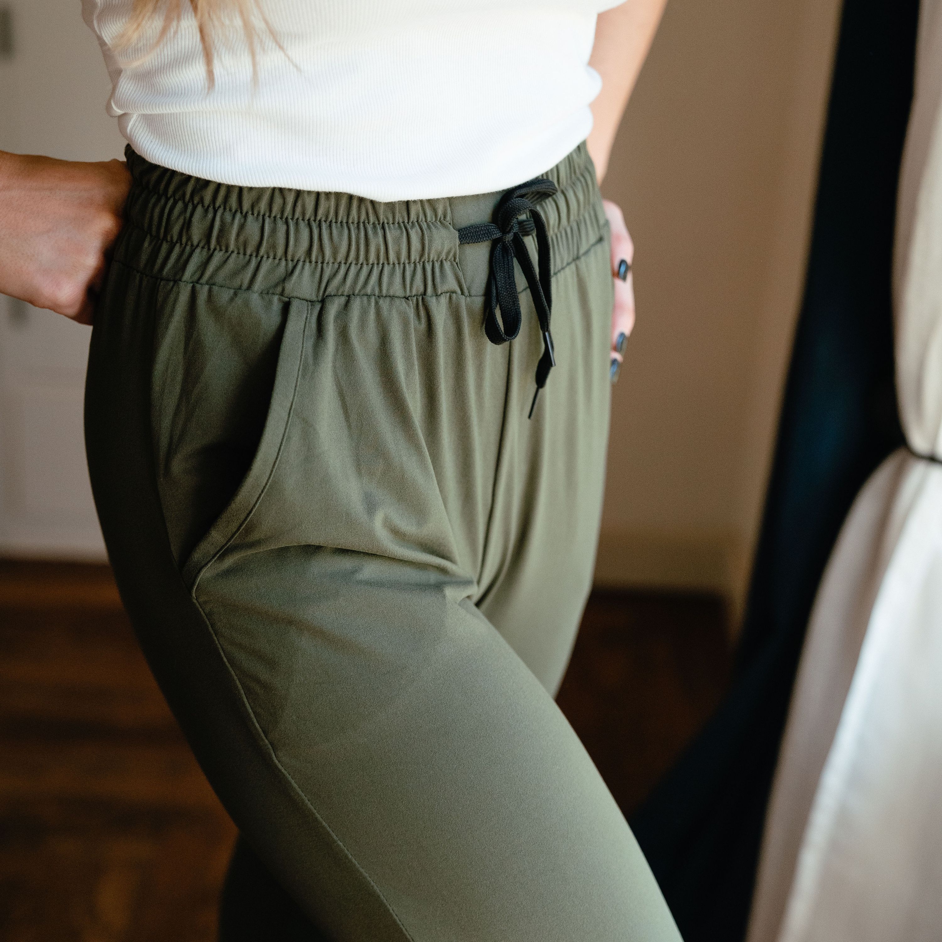 A pair of olive green ultra soft joggers, showcasing a comfortable fit with a stylish design, perfect for lounging or casual outings.