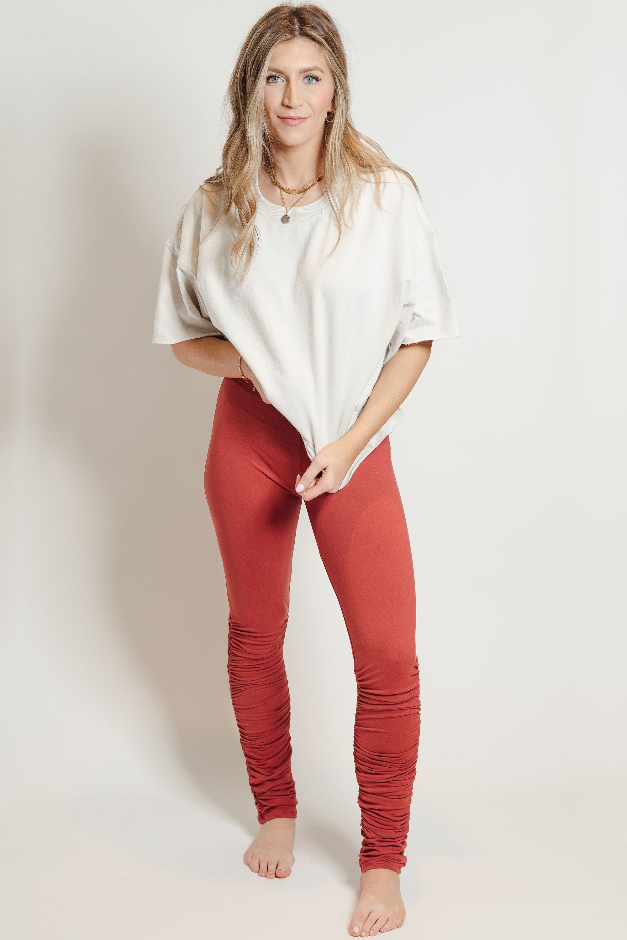 Ultra Soft Stacked Leggings in Brick color with ruffled bottoms, showcasing a comfortable fit and stylish design.