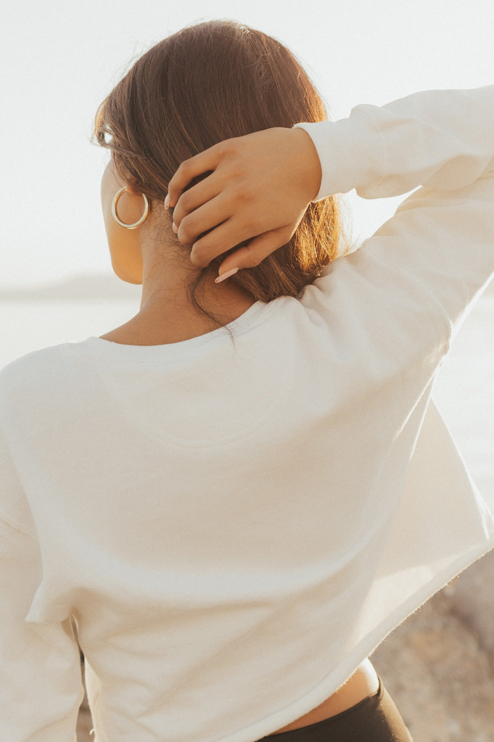 Upcycle The Voice Whitney Houston Sweatshirt in vintage white, featuring long sleeves and eco-friendly materials.