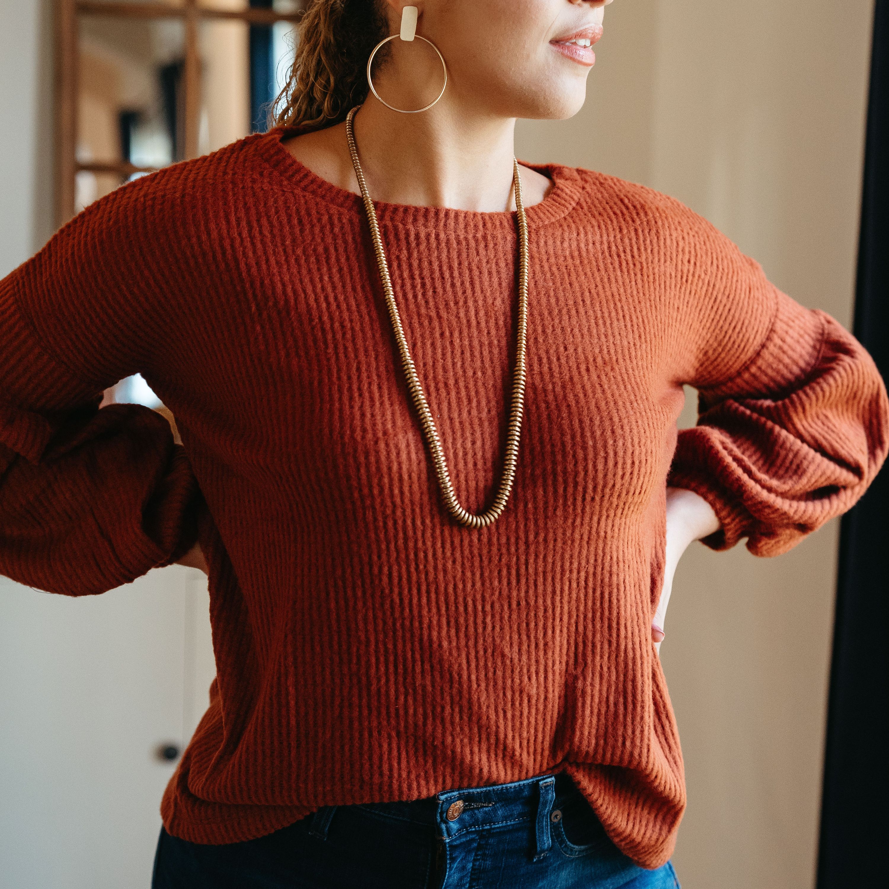 Urban Cozy Blouse in Brown featuring textured fabric and stylish cuffs, perfect for casual and dressy occasions.